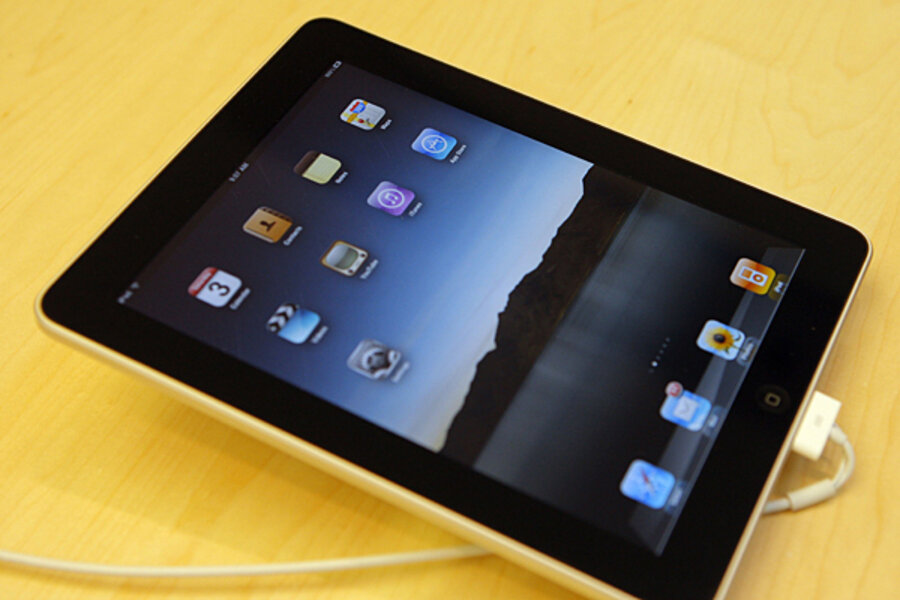 Apple earnings soar on iPhone, iPad sales, sending stock to giddy