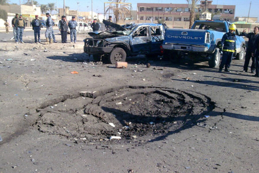 Suicide bombs in Iraq kill 14 in first big attack since government